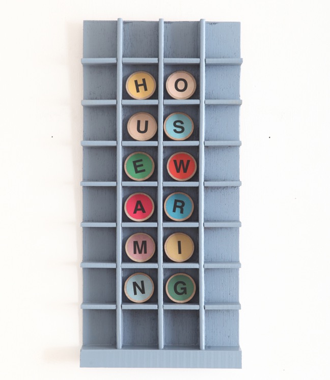 Housewarming letter game in old vintage type case