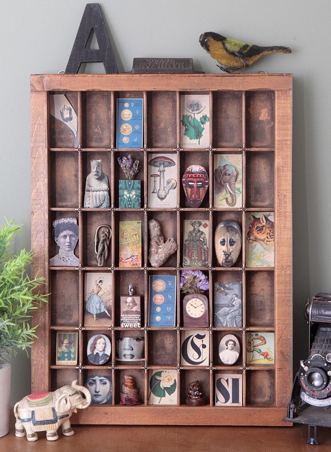 ￼￼Cabinet of curios and little collectables in an old antique letterpress printers tray type case drawer