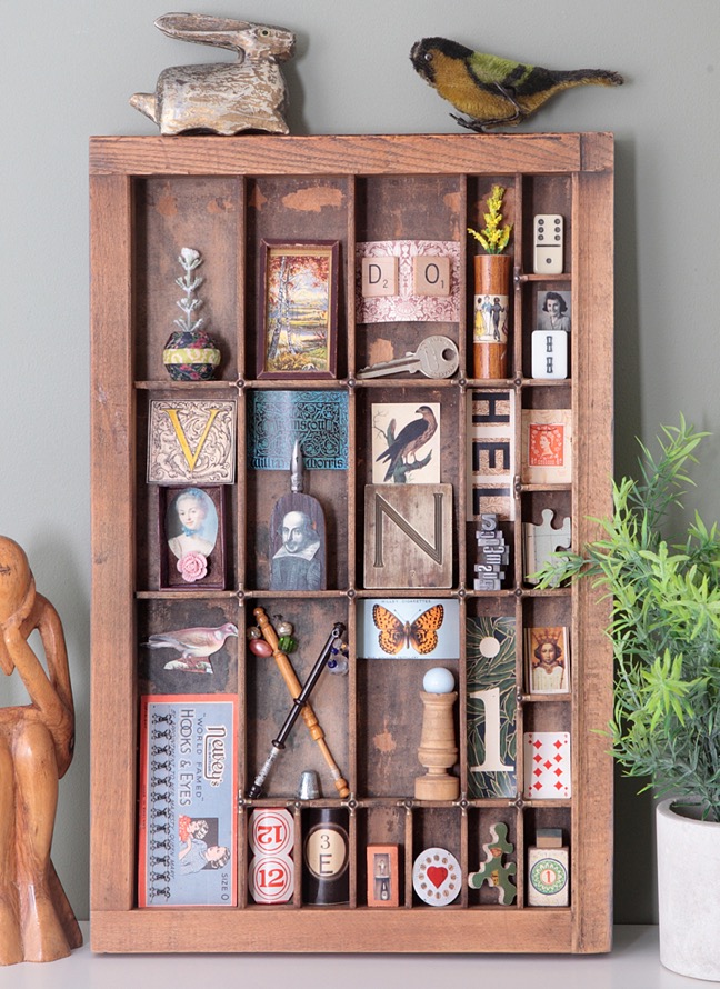 ￼￼Cabinet of curios and little collectables in an old antique letterpress printers tray type case drawer