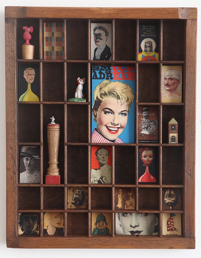 Quirky wall art display in up cycled letterpress printers tray type case