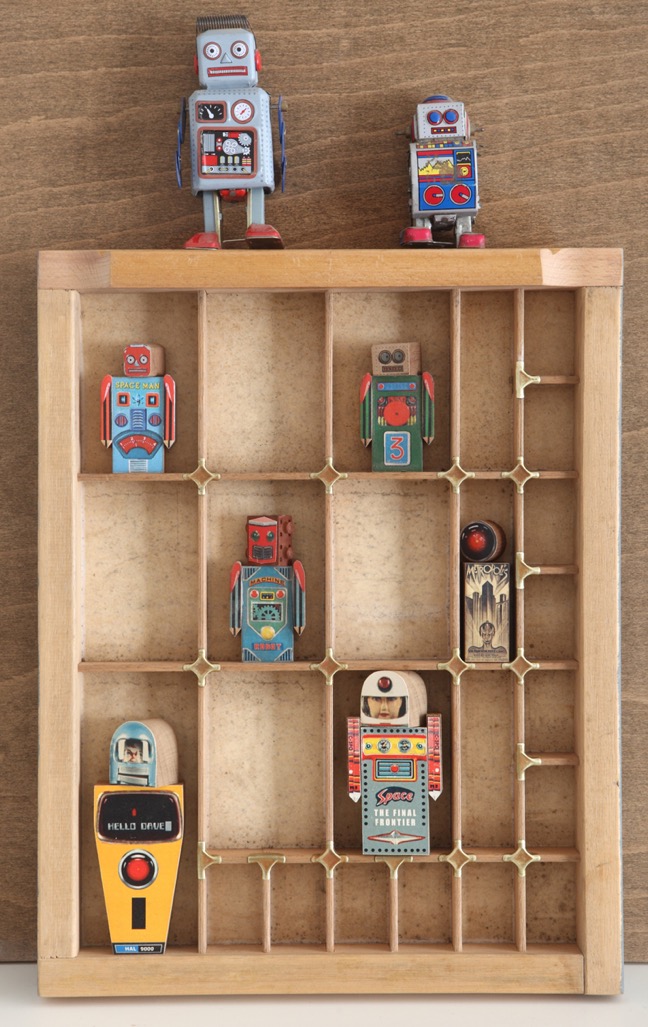 Vintage Robots in Old Printers Type Case
