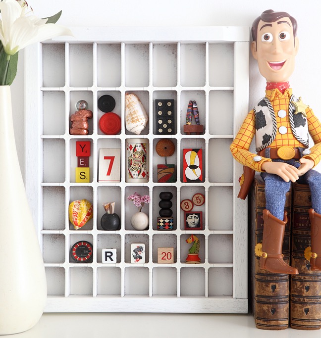 Wall art display of quirky little colourful items