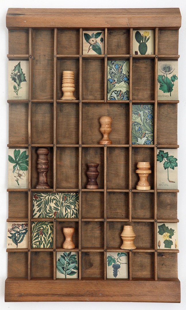 Up cycled Ludlow type case used as a display for little wooden vases and botanical prints