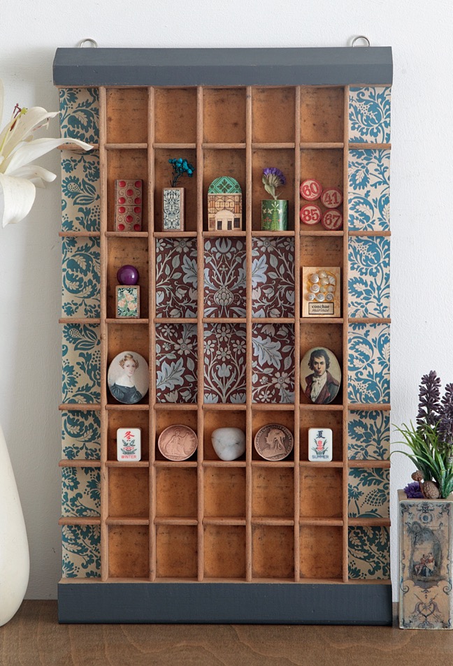 Great quirky display of little hand made curios and vintage items in an upcycled Ludlow printers type case 