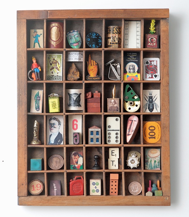 Quirky display of little vintage items in an old printers tray type case drawer