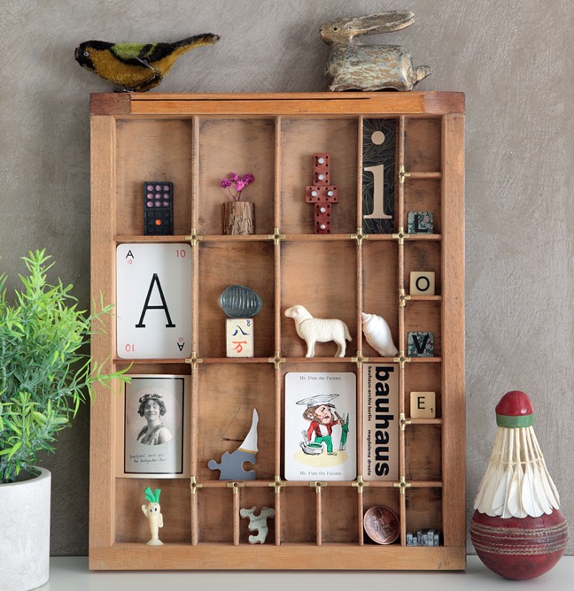 Old Letterpress printers tray used as a display for little quirky items and collectables